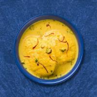 Rich Rasmalai · 2 pieces. Sweet and spongy cottage cheese flavored with cardamom.