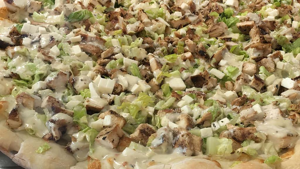 Chicken Caesar Salad Pizza · Chunks of chicken marinated chicken breast over romaine lettuce, topped with Caesar dressing from mozzarella.