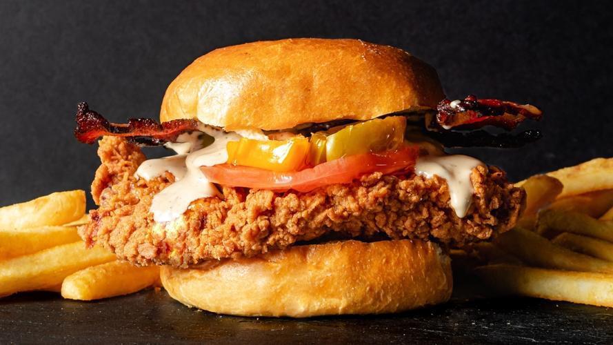 Chipotle Bird Combo · Fried buttermilk all-natural chicken, smoked bacon, organic tomatoes, pickled jalapeños, mike’s hot honey, chipotle buttermilk ranch, brioche bun.