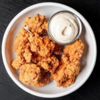 15 Piece Naked Style Boneless Wings (Gf) · Fried buttermilk all-natural boneless chicken wings served with your choice of sauce.