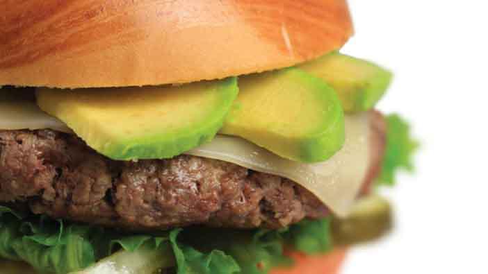 Avocado Swiss Burger · 100% Beef patty served with lettuce, tomato, pickles, grilled onions topped with melted Swiss cheese and slices of fresh avocado and our dijon mayo spread.