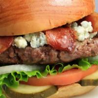 Blue Cheese Bacon Burger · Certified Angus Beef served with lettuce, tomato, pickle, and grilled onions, topped with bl...