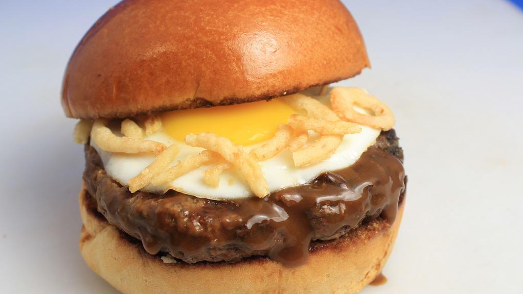Loco Moco Burger · 100% Beef patty cooked to perfection served with crispy fried onions, french mayo and covered with our savory gravy sauce and topped with an egg.