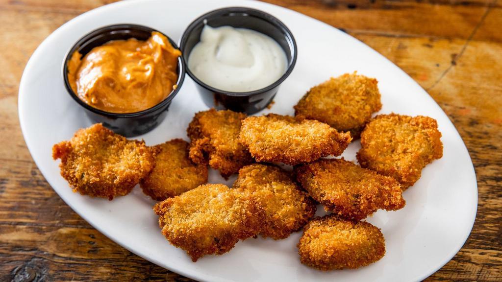 Fried Pickle Chips · Pickle slices hand breaded in house and fried to perfection. Served with a side of chipotle mayo.