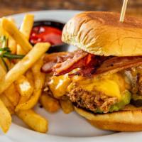 Clara'S Chicken Sandwich · Buttermilk brined Coleman's organic chicken thigh topped with cheddar cheese, applewood cold...