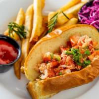 Lobster Roll · Lobster sautéed with butter, old bay seasoning and scallions, on a brioche roll with sauerkr...