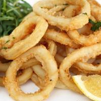 Fried Calamari · Calamari coated with seasoned flour and fried to perfection . Served with: Cocktail Sauce