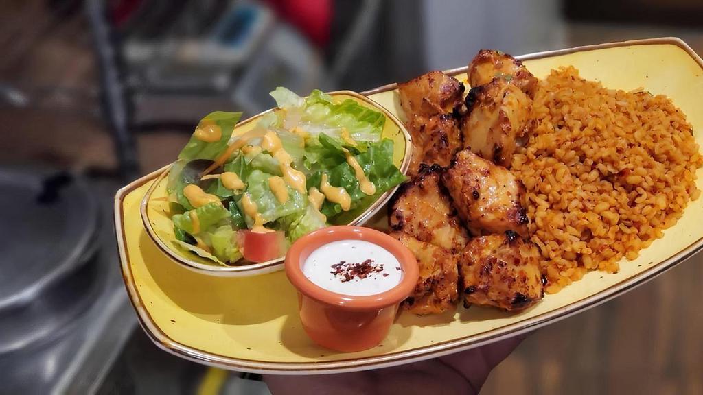 Chicken Shish · Skewed marinated cubes of chicken breast char-grilled to perfection