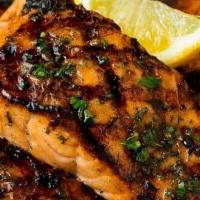 Salmon · Char-grilled filleted salmon seasoned with herbs & lemon juice