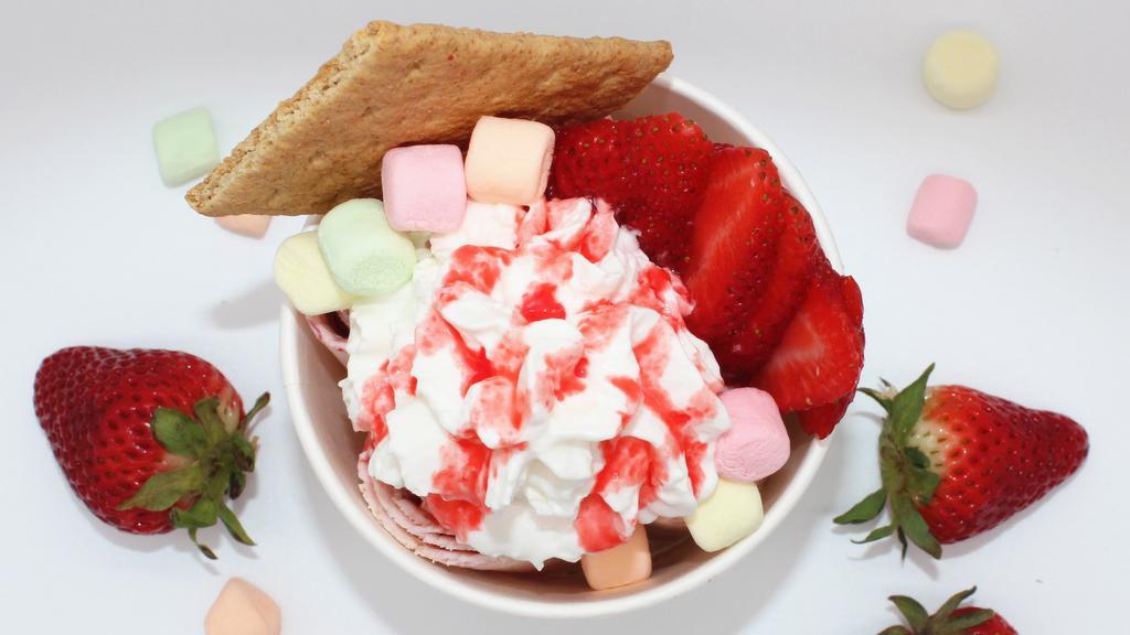 Strawberry Sweetie · Base; vanilla mix-in; fresh strawberry, graham cracker topping; fresh strawberry, graham cracker, flavored mini marshmallow other; strawberry drizzle, whipped cream.