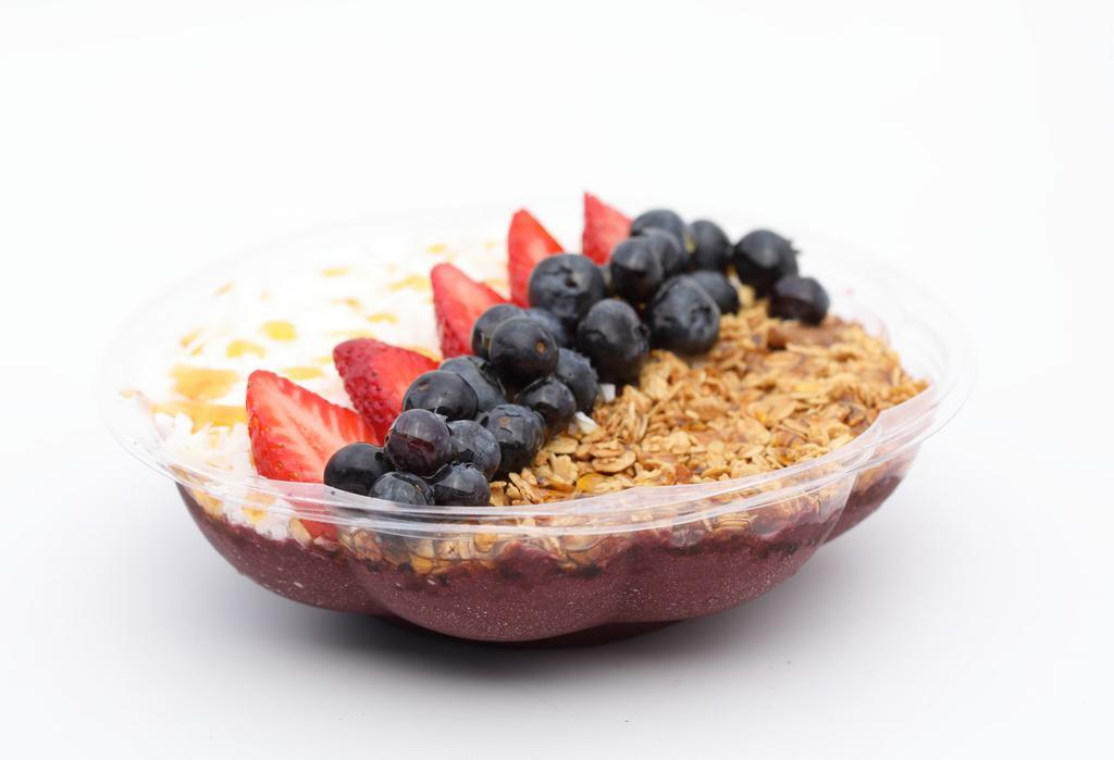 Pacific Beach · Blended acai topped with strawberry, blueberry, granola, coconut shavings, honey.