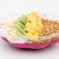 Copa Cabana · Blended pitaya topped with kiwi, pineapple, granola, coconut shavings, honey.