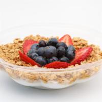 Americana · Blended coconut topped with strawberry, blueberry, granola, honey.