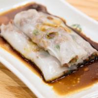 Steamed Rice Roll Stuffed With Bbq Pork · 