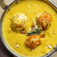 Malai Kofta · Homemade vegetable balls cooked in a mildly spiced creamy sauce with coconut and nuts.