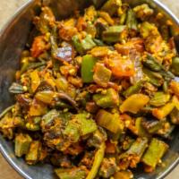 Bhindi Masala · Okra sautéed with onions, tomatoes and oriental spices.