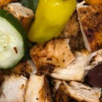Grilled Chicken Salad · Served with dressing and dinner rolls.
