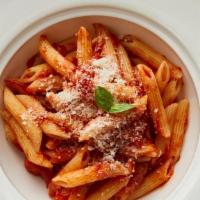 Pasta Pomodoro · Fresh plum tomato sauce simmered with spices, garlic and fresh basil. Served with salad and ...