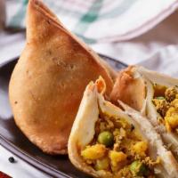 Punjabi Samosa · Savory pastry made with potatoes, peas and some spices.