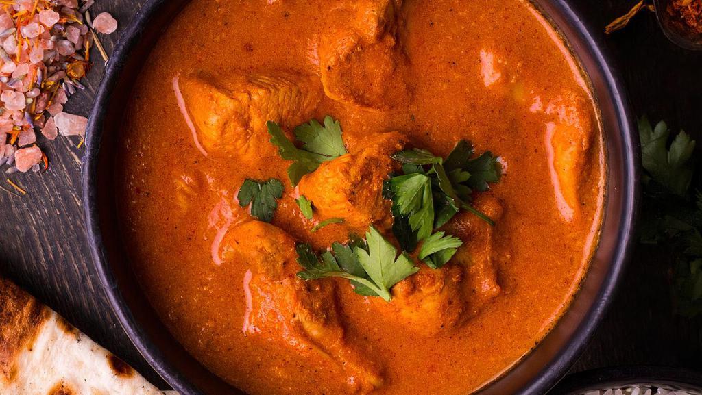 Chicken Curry · Chicken cooked with fresh ginger, garlic and spices.