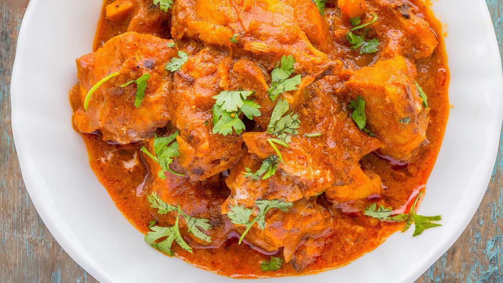 Chicken Vindaloo · From the Portuguese comes this fiery chicken dish with black peppercorns and vinegar.