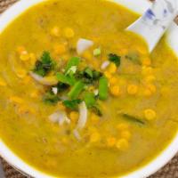 Chana Daal · Split yellow lentils tempered with mustard and cumin seeds.
