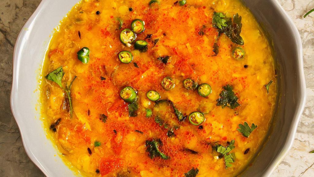 Moong Daal Lasooni · Yellow lentils tempered with garlic.