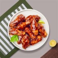 Bbq Wings · Fresh chicken wings breaded, fried until golden brown, and tossed in barbecue sauce. Served ...