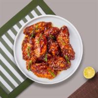 Teriyaki Wings · Fresh chicken wings breaded, fried until golden brown, and tossed in teriyaki sauce. Served ...