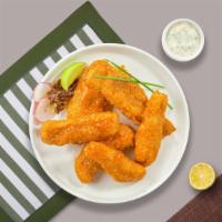 Buffalo Chicken Tenders · Chicken tenders breaded and fried until golden brown before being tossed in buffalo sauce.