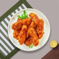 Bbq Chicken Tenders · Chicken tenders breaded and fried until golden brown before being tossed in barbecue sauce.
