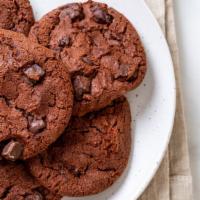 Giant Cookies · Freshly baked chocolate chip cookie.