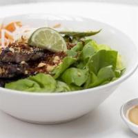 Bun Thit Nuong / Lemongrass Pork Bun Bowl · Fresh Cana bún noodles, smokey-charred lemongrass pork shoulder, lettuce, herbs, peanuts, fr...