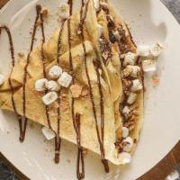 S'Mores Crepe · Graham cookies, marshmallows, Nutella and powdered sugar.