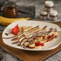 House Special Crepe · Nutella, strawberry, banana and powdered sugar.
