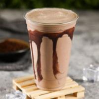 Chocolate Shake · Chocolate ice cream with chocolate syrup drizzled on the cup.