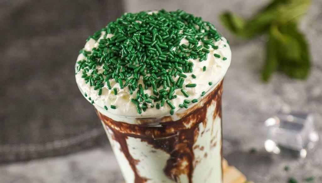 (Shake 16 Oz) Mint Choc.Chip  · 16 oz mint ice cream, whipped cream, and chocolate syrup drizzled on top.