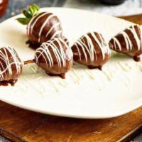 Strawberries Chocolate Dip · Dipped in milk chocolate with white chocolate drizzled on top.