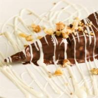 Cheesecake Chocolate Dip · Dipped in milk chocolate with white chocolate drizzled on top.