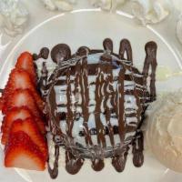 Chocolate  Lava Cake  · Moist Chocolate cake topped  with Chocolate Fudge , drizzled with White and dark Chocolate a...