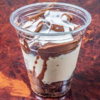 Brownie Kup · 12 oz. cup stacked with Van ice cream , milk chocolate and brownie bites . topped with brown...