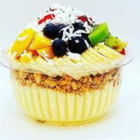 Coco Nutella Bowl · Blended organic raw coconut, banana, pineapple, coconut milk topped with banana, mango, kiwi...