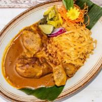 Khao Soi Chiang Mai (Chicken) · Spicy. Traditional northern style egg noodle with stew chicken drumsticks in the unique curr...