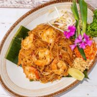 Pad Thai · Favorite. Stir-fried rice noodles with egg, bean curd, bean sprouts, scallions and crushed p...
