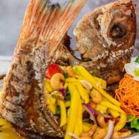 Crispy Red Snapper · Deep-fried whole red snapper with choice of mango salad or three-flavor sauce.