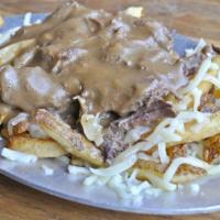 Short Rib Poutine · Crispy house cut fries topped with cabernet braised pulled short rib, Swiss, mozzarella and ...
