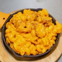 Buffalo Mac & Cheese · Cavatappi pasta, loaded with cheese and mixed with panko breaded chicken, choice of mild, me...