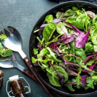 Baby Arugula Salad · Fresh garden salad prepared with Baby arugula, tomatoes, red onions, cranberries, ciliegine ...