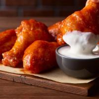 6 Traditional Wings · An order of our classic, crispy bone-in wings covered in your choice of sauce.