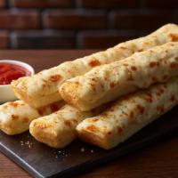 Cheese Sticks · 5 breadsticks topped with melted cheese and sprinkled with Italian seasoning. Served with ma...